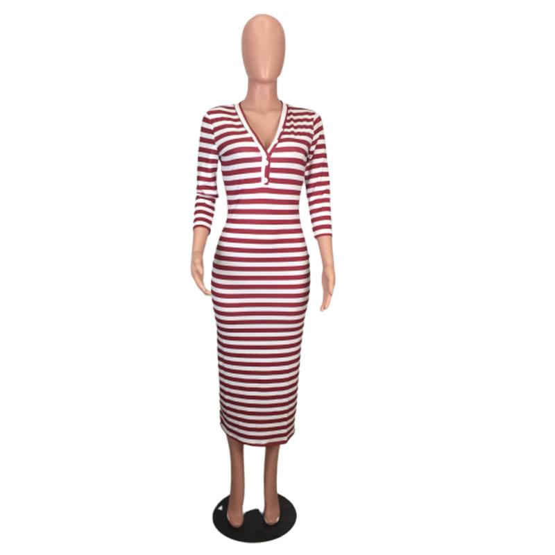 Sexy striped midi bodycon dress on mannequin, perfect for autumn and winter fashion trends.