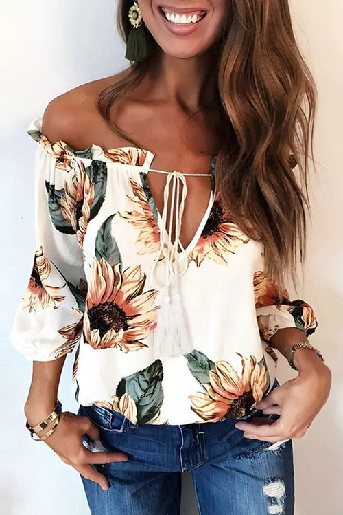 Floral ruffled tassel tie off shoulder blouse featuring sunflowers, perfect for a playful and stylish look.