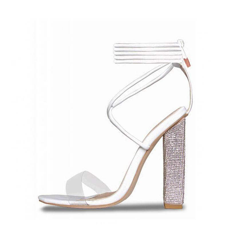 White transparent thick-heeled high-heeled sandals with open toes and stylish ankle strap.