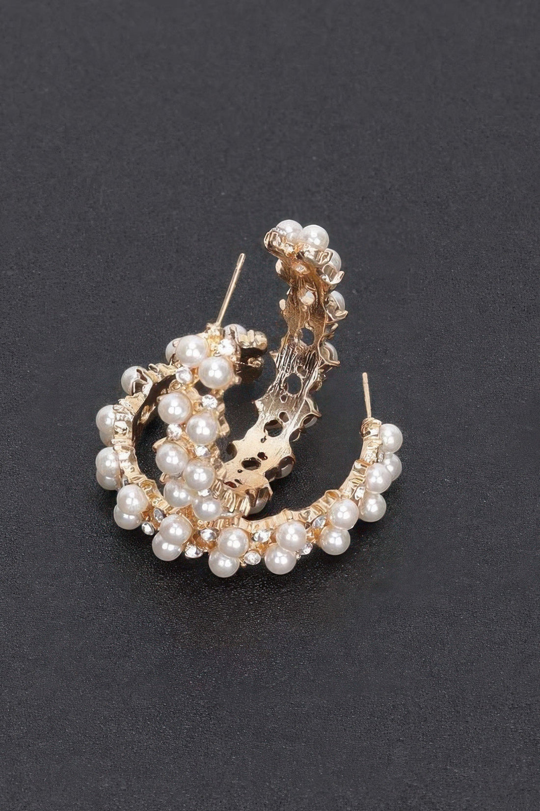 Gold hoop earrings with pearl accents