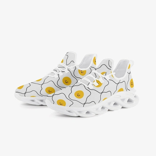 Playful white sneakers featuring smiling egg patterns, perfect for casual and fun outings.