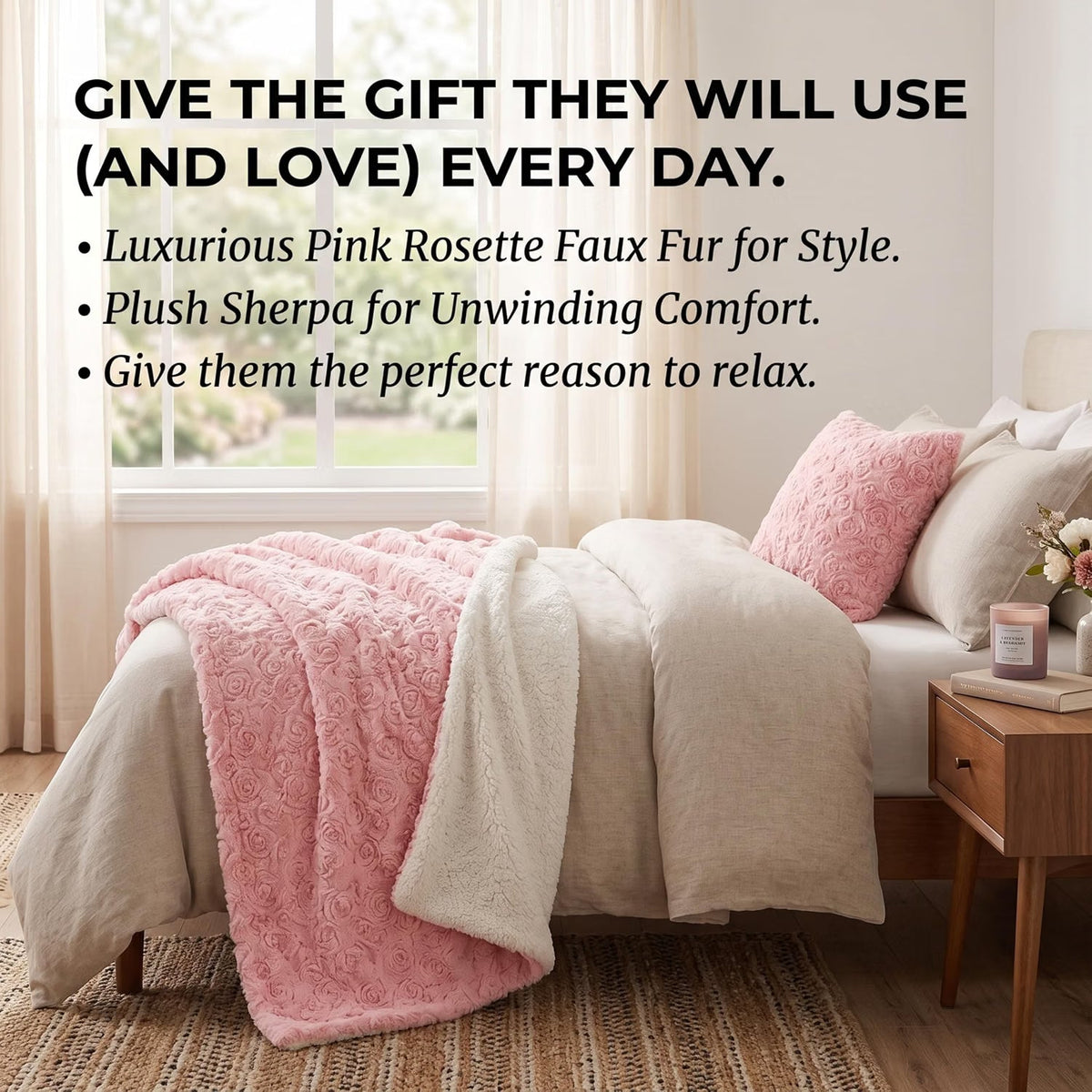 Pink faux fur throw blanket with rose bud texture and white sherpa back, view 4