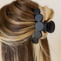 Large 4 inch matte black claw clip with circle design