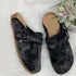 Black vintage canvas loafers with buckle detail, perfect for stylish and casual outfits.