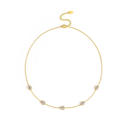 Dainty gold chain necklace with small teardrop gem stations, view 2
