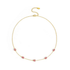 Dainty gold chain necklace with small teardrop gem stations, view 3