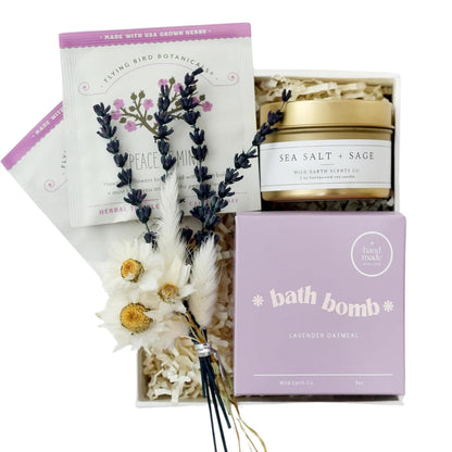 Lavender spa gift box with soy candle, bath bomb, herbal tea and dried flowers