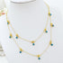 Dainty blue evil eye necklace on gold chain