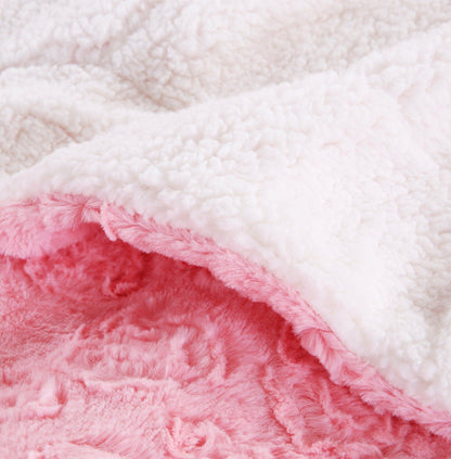 Pink faux fur throw blanket with rose bud texture and white sherpa back, view 7