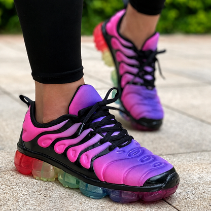 Stylish pink and purple running sneakers for women, perfect for summer workouts and fitness activities.